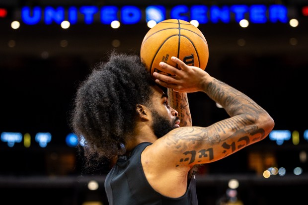 Chicago Bulls guard Coby White (0) warms up before a game against the Minnesota Timberwolves at the United Center on Nov. 7, 2024. (Tess Crowley/Chicago Tribune)