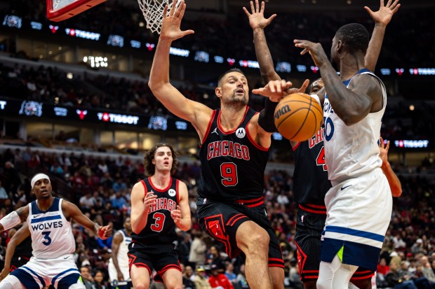 Chicago Bulls center Nikola Vucevic (9) reaches for a rebound during the first quarter at the United Center on Nov. 7, 2024. (Tess Crowley/Chicago Tribune)