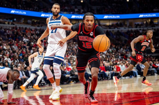 Chicago Bulls forward Julian Phillips (15) reaches for a rebound during the second quarter at the United Center on Nov. 7, 2024. (Tess Crowley/Chicago Tribune)