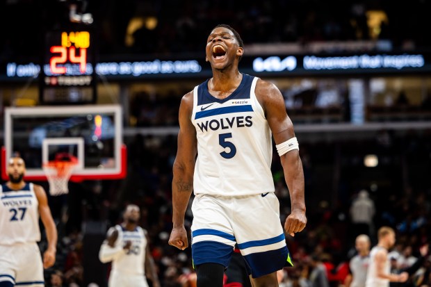 Minnesota Timberwolves guard Anthony Edwards (5) celebrates after scoring a basket during the fourth quarter at the United Center on Nov. 7, 2024. The Chicago Bulls lost 135-119 against the Minnesota Timberwolves. (Tess Crowley/Chicago Tribune)