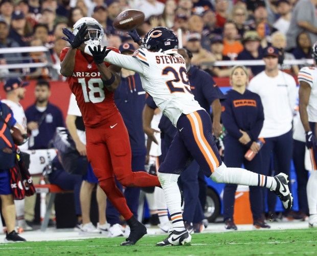 Bears cornerback Tyrique Stevenson breaks up a pass meant for Cardinals wide receiver Marvin Harrison Jr. in the second half at State Farm Stadium on Nov. 3, 2024. (Stacey Wescott/Chicago Tribune)