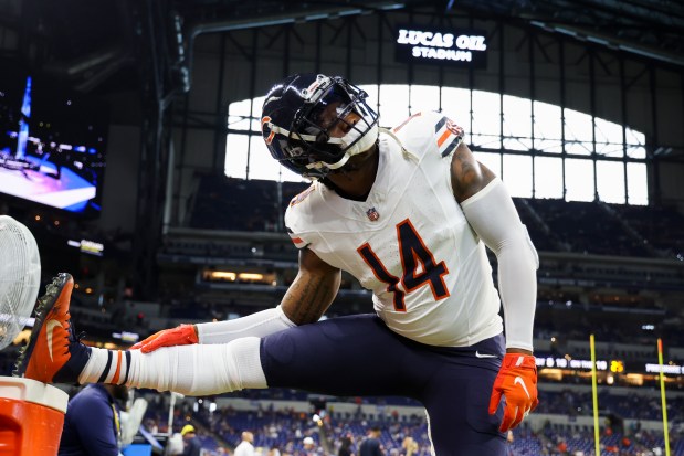 Chicago Bears tight end Gerald Everett (14) stretches before the game against the Indianapolis Colts at Lucas Oil Stadium in Indianapolis on Sunday, Sept. 22, 2024.(Eileen T. Meslar/Chicago Tribune)