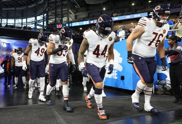 Bears players head to the field to warm up for a game against the Lions at Ford Field on Nov. 28, 2024, in Detroit. (John J. Kim/Chicago Tribune)