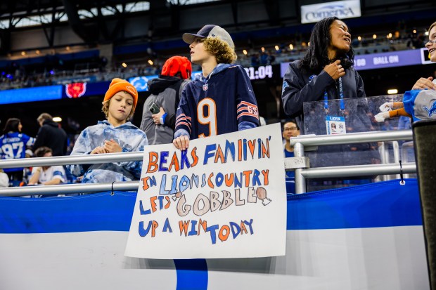 Lions fans watch players warm up before the Bears play against the Lions at Ford Field in Detroit on Nov. 28, 2024. (Tess Crowley/Chicago Tribune)