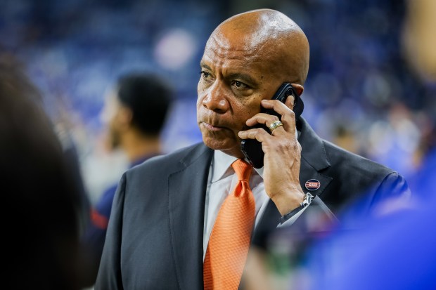 Bears President Kevin Warren talks on the sideline before the Bears play against the Lions at Ford Field in Detroit on Nov. 28, 2024. (Tess Crowley/Chicago Tribune)