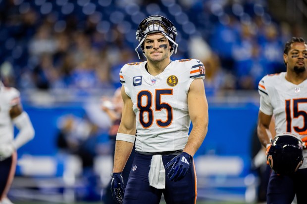 Bears tight end Cole Kmet (85) warms up before the Bears play against the Lions at Ford Field in Detroit on Nov. 28, 2024. (Tess Crowley/Chicago Tribune)