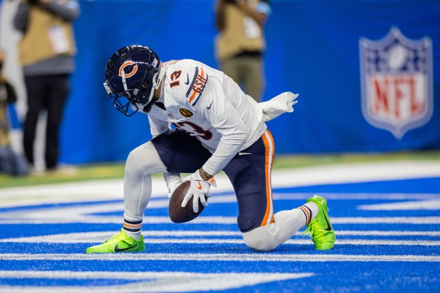 Bears wide receiver Keenan Allen (13) scores a touchdown during the third quarter in a game against the Lions at Ford Field in Detroit on Nov. 28, 2024. The Bears lost 23-20. (Tess Crowley/Chicago Tribune)