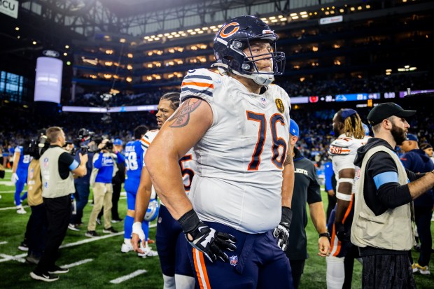 Bears guard Teven Jenkins (76) walks on the field after losing a game against the Lions at Ford Field in Detroit on Nov. 28, 2024. The Bears lost 23-20. (Tess Crowley/Chicago Tribune)