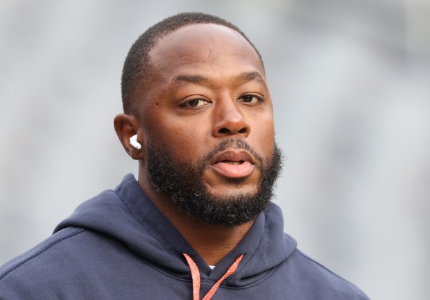 Bears offensive coordinator Thomas Brown walks the perimeter of the field before a game against the Packers at Soldier Field on Nov. 17, 2024. (John J. Kim/Chicago Tribune)