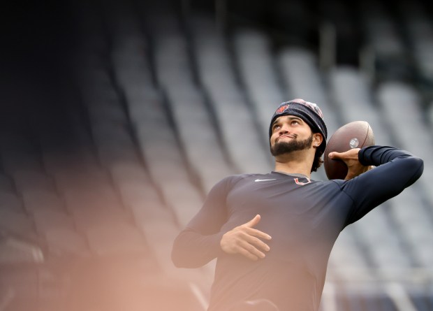 Bears quarterback Caleb Williams warms up before a game against the Packers. (John J. Kim/Chicago Tribune)