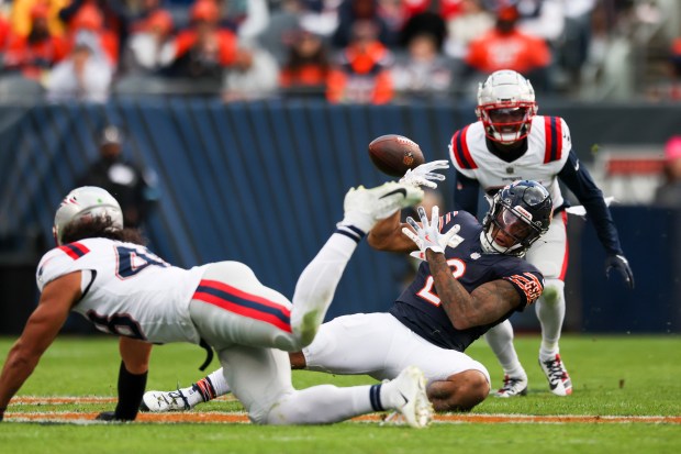 New England Patriots linebacker Jahlani Tavai (48) breaks up a pass to Chicago Bears wide receiver DJ Moore (2) during the third quarter at Soldier Field. (Eileen T. Meslar/Chicago Tribune)