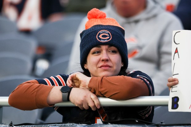 A Chicago Bears fan sits in the stands during the fourth quarter against the New England Patriots at Soldier Field on Nov. 10, 2024. (Eileen T. Meslar/Chicago Tribune)