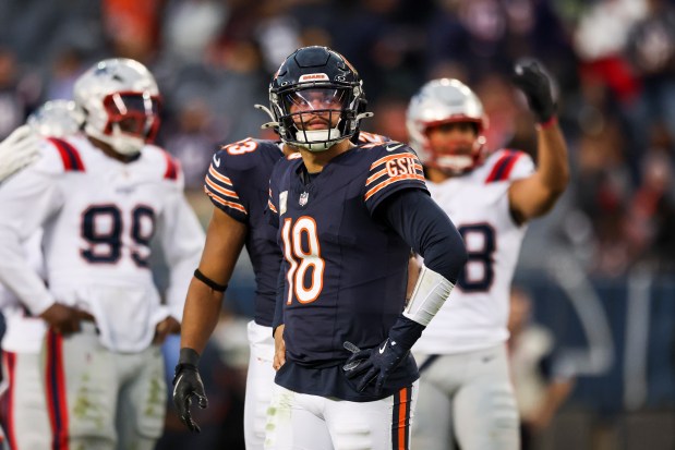 Chicago Bears quarterback Caleb Williams (18) reacts after getting sacked during the fourth quarter against the New England Patriots at Soldier Field on Nov. 10, 2024. (Eileen T. Meslar/Chicago Tribune)