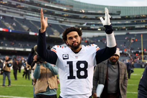 Bears quarterback Caleb Williams walks off the field after losing to the Vikings in overtime 30-27 at Soldier Field on Nov. 24, 2024. (Eileen T. Meslar/Chicago Tribune)