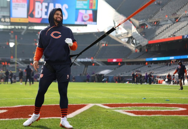 Chicago Bears quarterback Caleb Williams stretches out before the start of a game between the Chicago Bears and the Minnesota Vikings at Soldier Field on Nov. 24, 2024 in Chicago. (Stacey Wescott/ Chicago Tribune)