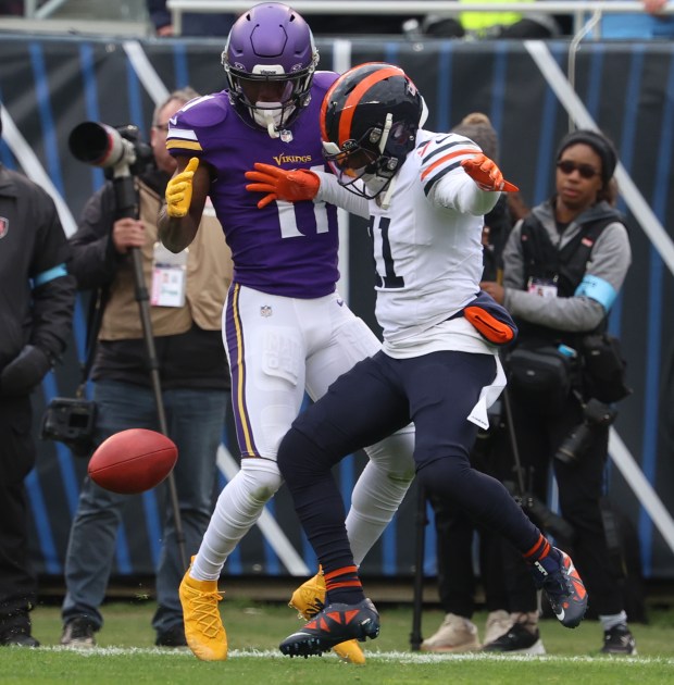 Chicago Bears kick returner DeAndre Carter (11) lets the football hit him after calling for a fair catch and the Minnesota Vikings recover it in the third quarter at Soldier Field on Nov. 24, 2024 in Chicago. Defending is Minnesota Vikings wide receiver Trent Sherfield Sr. (11). (Stacey Wescott/ Chicago Tribune)