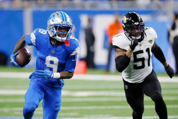 Lions wide receiver Jameson Williams is pursued by Jaguars linebacker Ventrell Miller on a 64-yard touchdown reception Nov. 17, 2024, in Detroit. (AP Photo/Duane Burleson)