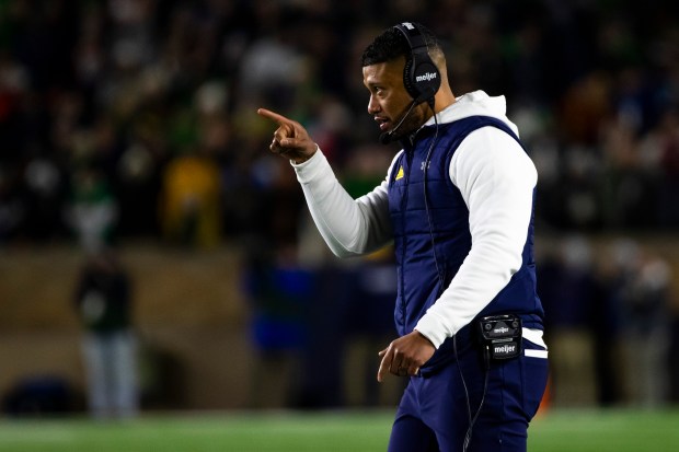 Notre Dame coach Marcus Freeman points to players during the first half against Florida State on Saturday, Nov. 9, 2024, in South Bend, Ind. (AP Photo/Michael Caterina)