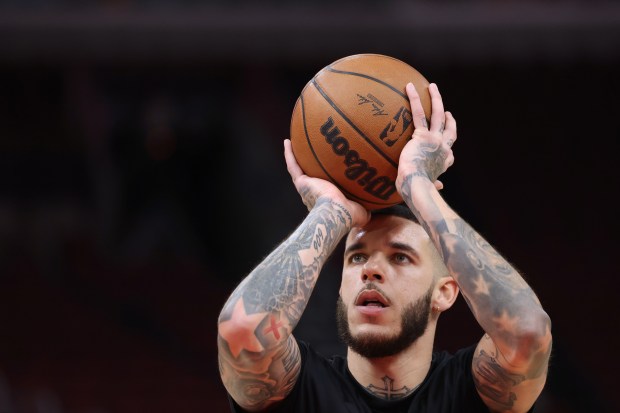 Bulls guard Lonzo Ball warms up for a preseason game against the Cavaliers at the United Center on Oct. 18, 2024. (John J. Kim/Chicago Tribune)