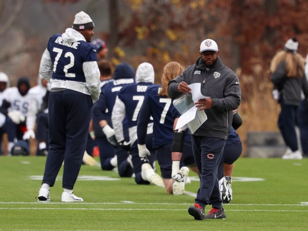 New Bears offensive coordinator Thomas Brown walks across the field during practice at Halas Hall on Nov. 13, 2024. (Stacey Wescott/Chicago Tribune)