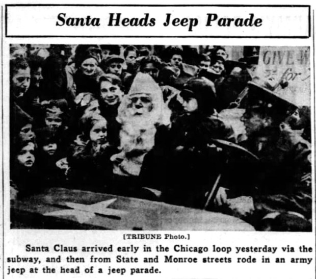 During World War II, Santa Claus arrived for the State Street Council parade on Nov. 20, 1943, by bursting through a smoke screen in a Jeep. (Chicago Tribune)