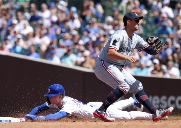 Cubs centerfielder Pete Crow-Armstrong beats the throw to steal second base in the third inning against the Twins at Wrigley Field on Aug. 7, 2024, in Chicago. (John J. Kim/Chicago Tribune)