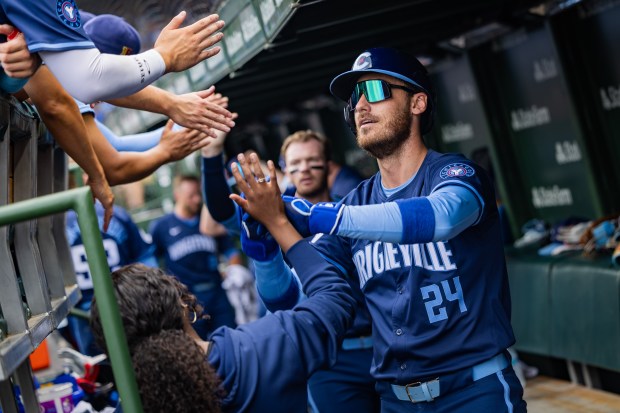 Chicago Cubs right fielder Cody Bellinger (24) celebrates after hitting a two-run home run in the first inning against the Toronto Blue Jays at Wrigley Field in Chicago on Aug. 16, 2024. The Cubs won 6-5 against the Toronto Blue Jays. (Tess Crowley/Chicago Tribune)