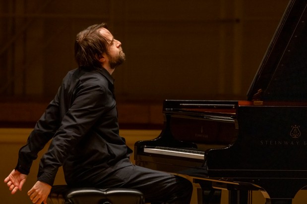 Daniil Trifonov finishes a piece during a recital of Tchaikovsky, Chopin and Barber on Nov. 17, 2024. (Brian Cassella/Chicago Tribune)