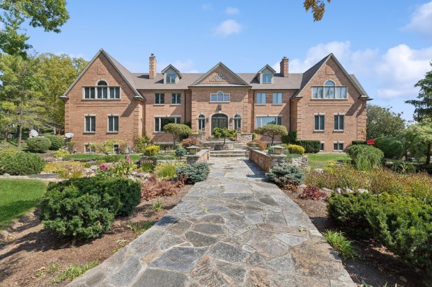 A nine-bedroom mansion on a gated, 53-acre estate in Grayslake was listed on Tuesday for $9.975 million. (VHT)