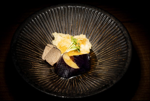 Age-Mono: fluke, salmon terrine, w/dashi, broth and truffle, at Omakase Shoji. (E. Jason Wambsgans/Chicago Tribune)