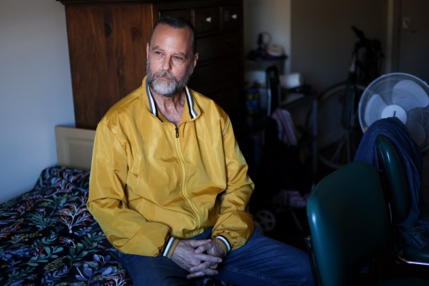 Jeff Martin in his apartment in the Leland in the Uptown neighborhood on Nov. 7, 2024, where he has lived for almost two years. (Eileen T. Meslar/Chicago Tribune)