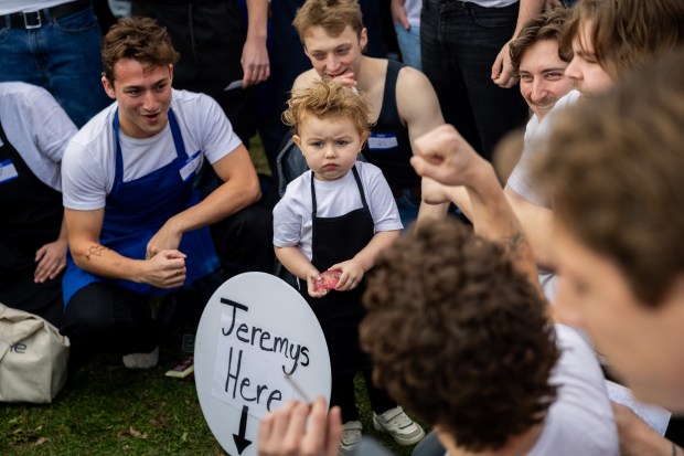 Massimo Morelli, 2, center, participates in a Jeremy Allen White lookalike competition at Humboldt Park in Chicago on Nov. 16, 2024. (Tess Crowley/Chicago Tribune)