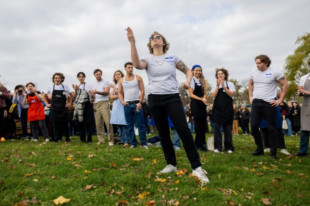 People participate in a Jeremy Allen White lookalike competition at Humboldt Park in Chicago on Nov. 16, 2024. (Tess Crowley/Chicago Tribune)