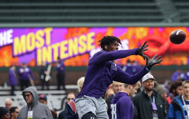 Northwestern wide receiver Calvin Johnson II warms up for a game against Ohio State at Wrigley Field on Nov. 16, 2024, in Chicago. (John J. Kim/Chicago Tribune)