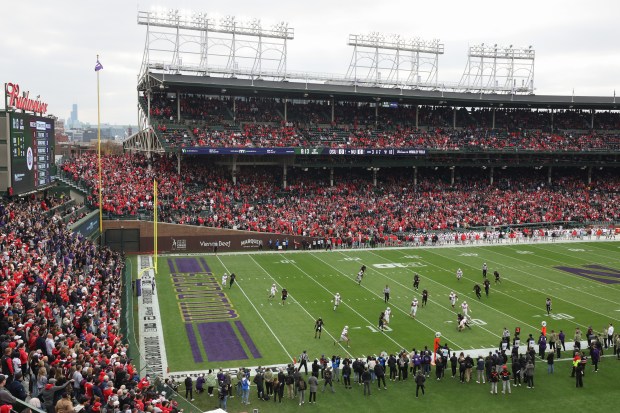 Northwestern advances the ball against Ohio State in the first quarter at Wrigley Field on Nov. 16, 2024, in Chicago. (John J. Kim/Chicago Tribune)