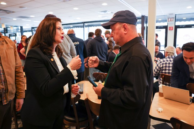 Cook County state's attorney Democratic candidate Eileen O'Neill Burke speaks with John Shostack on Election Day. (Eileen T. Meslar/Chicago Tribune)