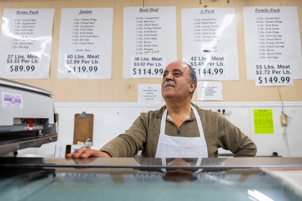 Western Meats owner Albert Couri at his shop in Peoria on Nov. 20, 2024. (Tess Crowley/Chicago Tribune)