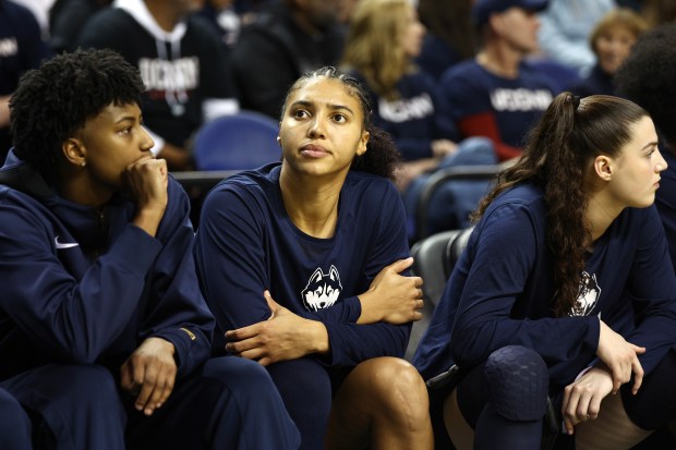 UConn's Azzi Fudd looks on from the sideline during a game against North Carolina on Nov. 15, 2024, in Greensboro, N.C. (Jared C. Tilton/Getty Images)