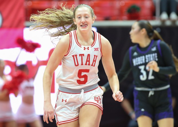 Utah's Gianna Kneepkens reacts after sinking a 3-pointer against Weber State on Nov. 7, 2024, in Salt Lake City. (Chris Gardner/Getty Images)