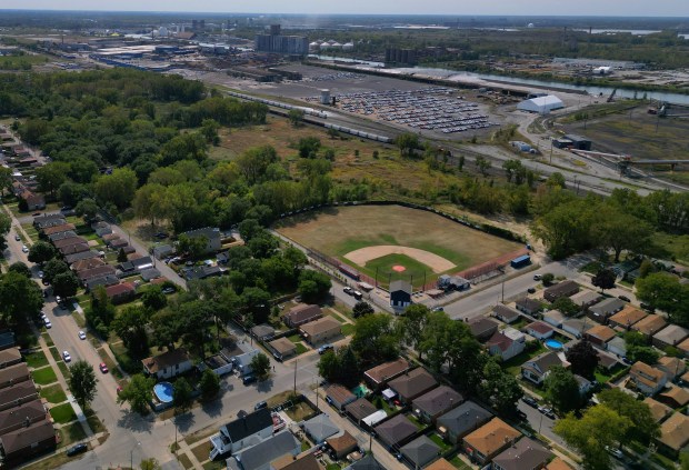 The former East Side Little League Senior Field and a neighborhood of brick bungalows border the 144-acre Invert Chicago property. (Stacey Wescott/Chicago Tribune)