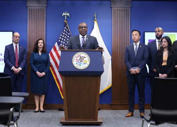 Attorney General Kwame Raoul, joined by state's attorneys from around Illinois, and members of the Conviction Integrity Unit, announces the launch of Illinois' first targeted effort to evaluate the integrity of convictions throughout the state, during a news conference at the 555 W. Monroe St. office on Nov. 12, 2024. (Antonio Perez/Chicago Tribune)