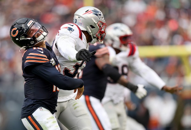 Chicago Bears quarterback Caleb Williams (18) follows through on an incomplete pass in the fourth quarter of a game against the New England Patriots at Soldier Field in Chicago on Nov. 10, 2024. (Chris Sweda/Chicago Tribune)