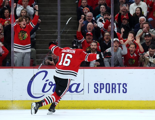 Chicago Blackhawks center Jason Dickinson (16) celebrates after scoring a goal in the first period of a game against the Anaheim Ducks at the United Center in Chicago on Nov. 19, 2024. (Chris Sweda/Chicago Tribune)