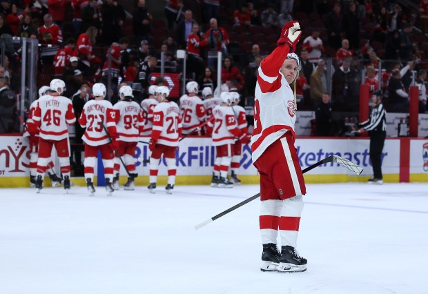 Detroit Red Wings right wing Patrick Kane (88) waves up into the crowd after a Red Wings victory over the Chicago Blackhawks at the United Center in Chicago on Nov. 6, 2024. (Chris Sweda/Chicago Tribune)