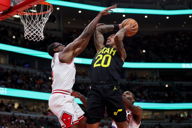 Chicago Bulls forward Jalen Smith (7) guards Utah Jazz forward John Collins (20) during the first quarter at the United Center Monday Nov. 4, 2024, in Chicago. (Armando L. Sanchez/Chicago Tribune)