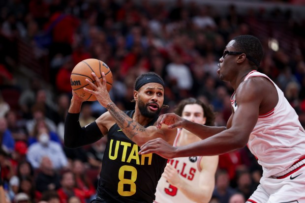 Utah Jazz guard Patty Mills (8) drives against Chicago Bulls forward Jalen Smith (7) during the second quarter at the United Center Monday Nov. 4, 2024, in Chicago. (Armando L. Sanchez/Chicago Tribune)