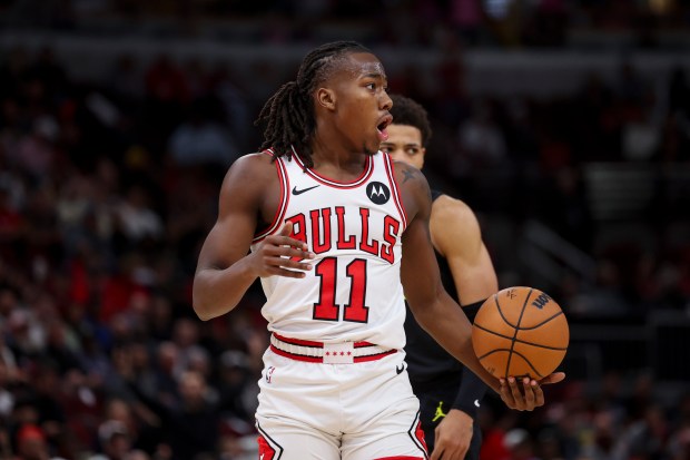 Chicago Bulls guard Ayo Dosunmu (11) reacts after fouling Utah Jazz guard Keyonte George (3) during the second quarter at the United Center Monday Nov. 4, 2024, in Chicago. (Armando L. Sanchez/Chicago Tribune)