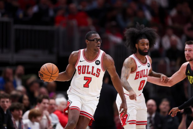 Chicago Bulls forward Jalen Smith (7) dribbles the ball during the second quarter against the Utah Jazz at the United Center Monday Nov. 4, 2024, in Chicago. (Armando L. Sanchez/Chicago Tribune)