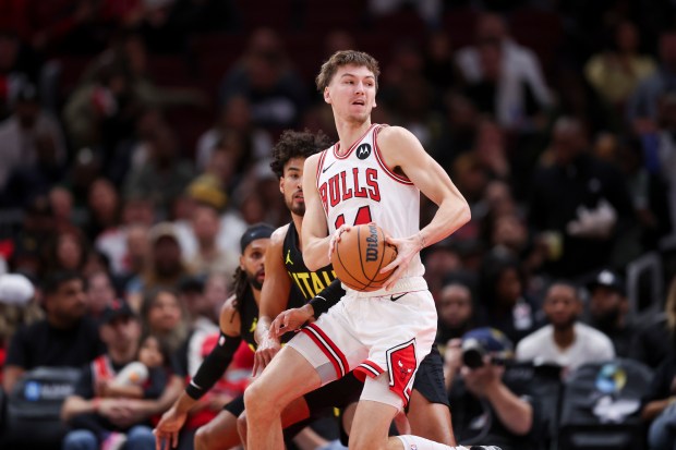 Chicago Bulls forward Matas Buzelis (14) drives to the basket during the second quarter against the Utah Jazz at the United Center Monday Nov. 4, 2024, in Chicago. (Armando L. Sanchez/Chicago Tribune)