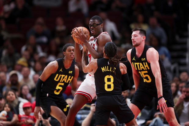 Utah Jazz forward Cody Williams (5), Utah Jazz guard Patty Mills (8), and Utah Jazz forward Drew Eubanks (15) guard Chicago Bulls forward Jalen Smith (7) during the second quarter at the United Center Monday Nov. 4, 2024, in Chicago. (Armando L. Sanchez/Chicago Tribune)